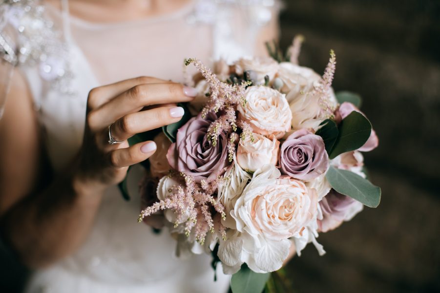 bride-holds-beautiful-wedding-bouquet-pink-white-flowers-her-handsx9