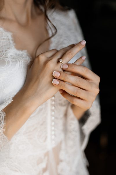 hands-bride-with-tender-engagement-ring